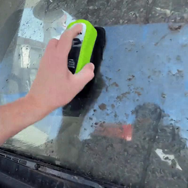 One pass of the applicator across a grimy truck windshield
